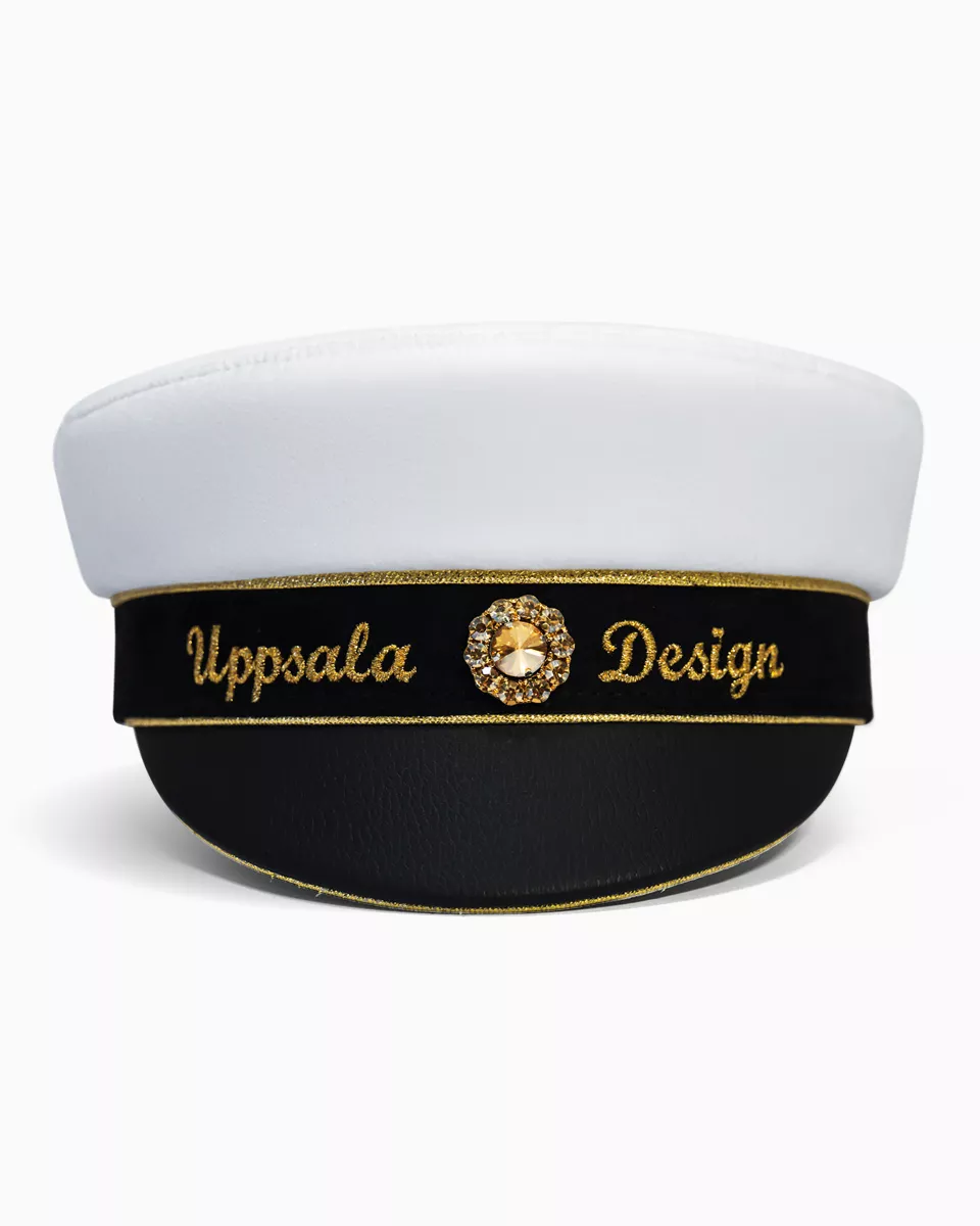 A white and black hat with 'Modern Design' embroidered on it